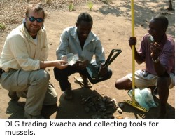 Daniel Graf trading kwacha and collecting tools for mussels.