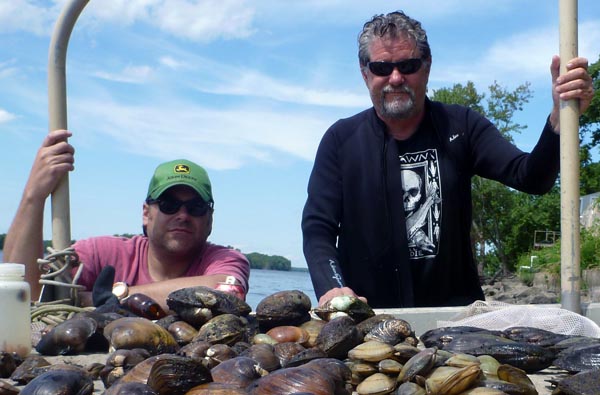 DLG and KSC with a haul of mussels from the Mississippi River (2013).