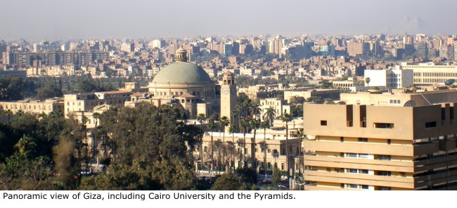 Panoramic view of Giza, including Cairo University and the Pyramids.