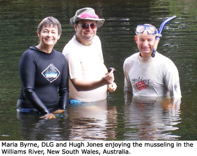 Maria Byrne, Daniel Graf and Hugh Jones enjoying the musseling in the Williams River, New South Wales, Australia.