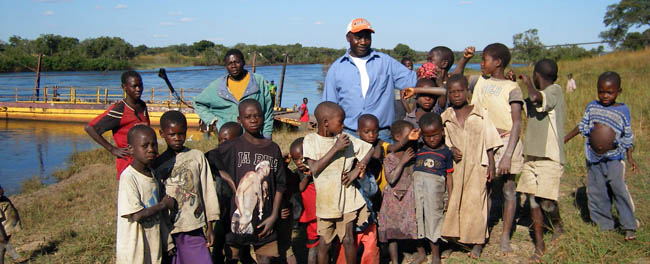 Alex Chilala and our local helpers at the Sawfa Pontoon on the Chambeshi River.
