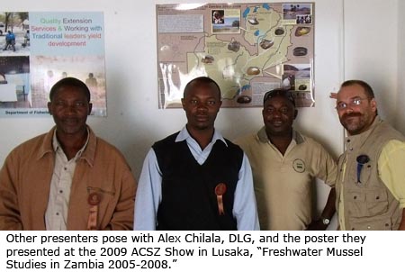 Other presenters pose with Alex Chilala, Daniel Graf, and the poster they presented at the 2009 ACSZ Show in Lusaka, "Freshwater Mussel Studies in Zambia 2005-2008."